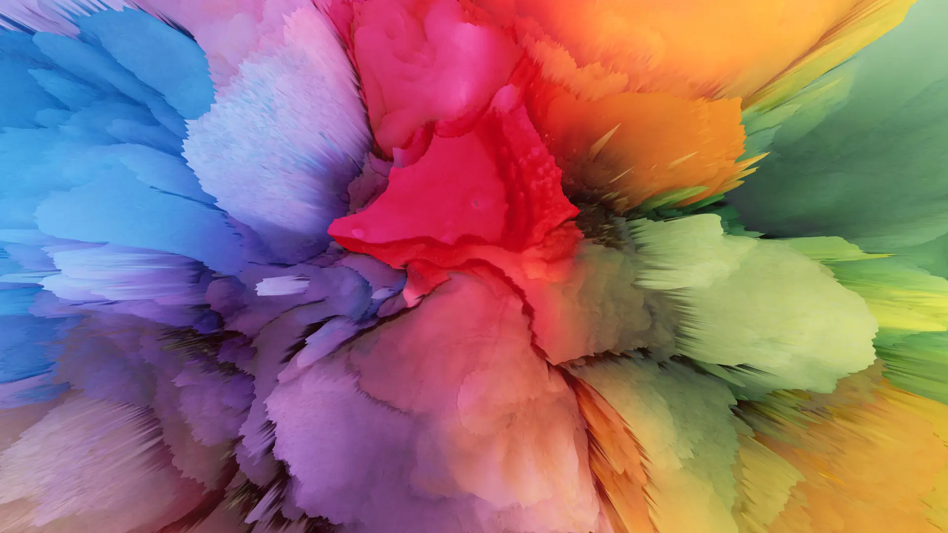 Explosion of blue, purple, red, orange and green color splashes on a dark background