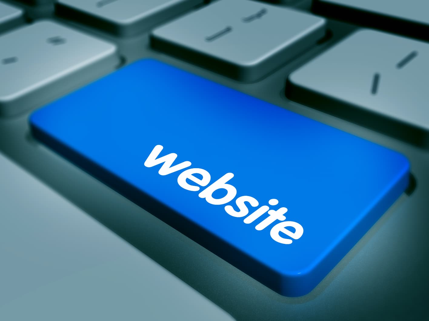 Un clavier avec la touche entrée comme étant marqué website